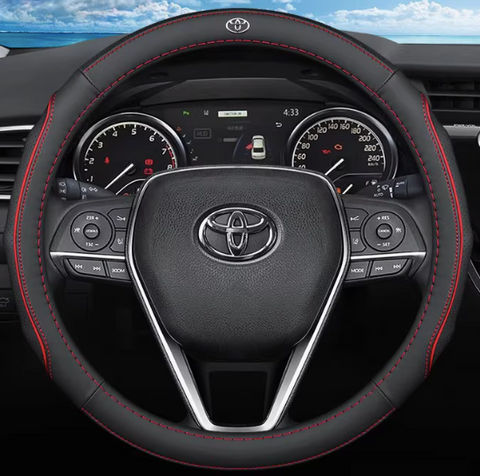 Шкіряний чохол на кермо автомобіля Toyota червоний 60031 фото
